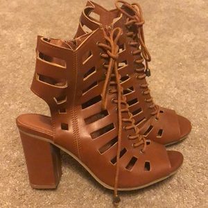 Strapped ankle heels